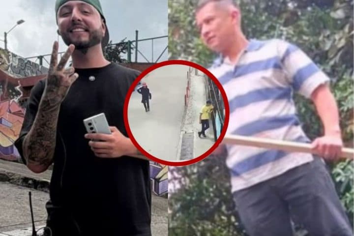 Dos velas encendidas junto a flores blancas en un altar improvisado en Bogotá.