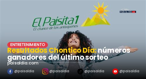 Un grupo de apostadores en un local de apuestas celebra la victoria con el número 8901 en sus boletos.