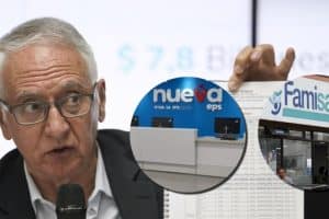 Bruce Mac Master, con gesto serio, habla en conferencia de prensa en Bogotá.