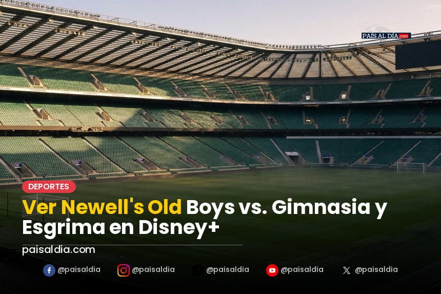 Hinchas de Newell's Old Boys animan en el estadio, banderas ondeando y camisetas rojinegras.